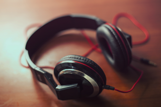Somewhat counterintuitively, headphones utilizing HRTFs can create more convincing 3D audio than external speakers, thanks to a more consistent and direct position with respect to the ear.