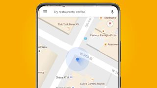 A phone on an orange background showing Google Maps