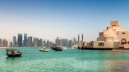 view of Doha, Qatar, water and buildings in background