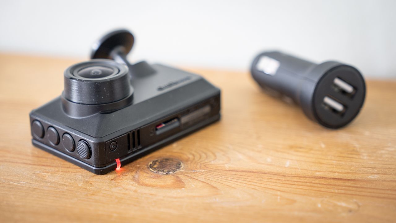 Garmin Dash Cam X110 on a wooden table