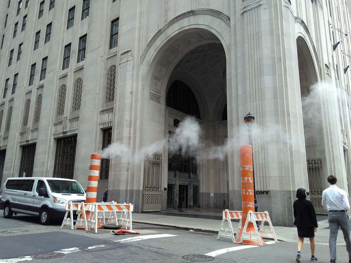 These orange sewer vents are washed out in front of Sony's NYC HQ.