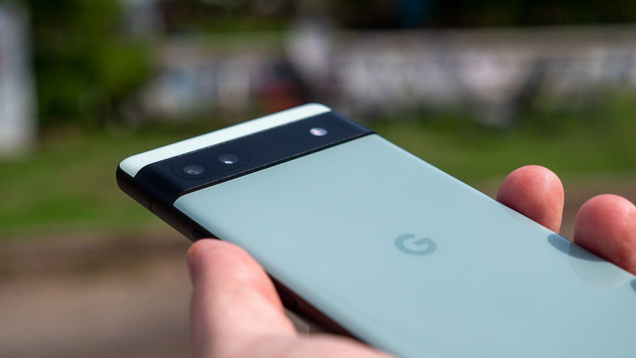 Holding the Google Pixel 6a