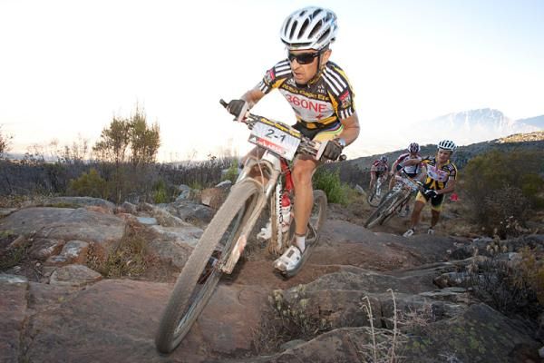 Christoph Sauser of Team 360ne Songo-Specialized leads the first bunch to climb the old oxwagon trail