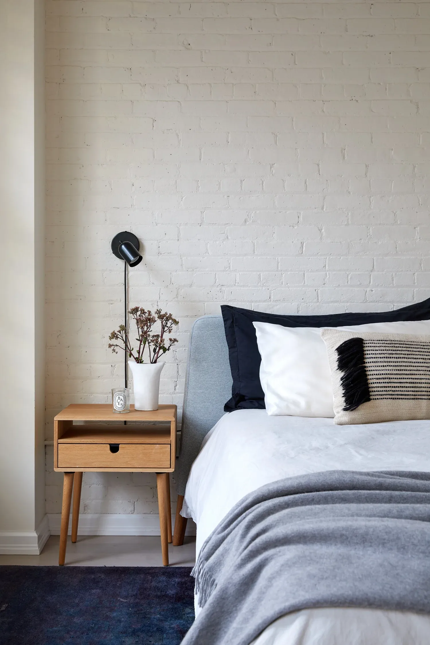 bedroom with plug in corded bedside lighting