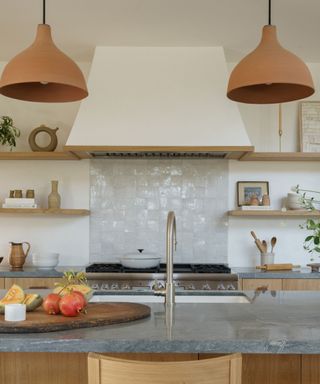 farmhouse kitchen with wooden cabinets and white zellige tiles