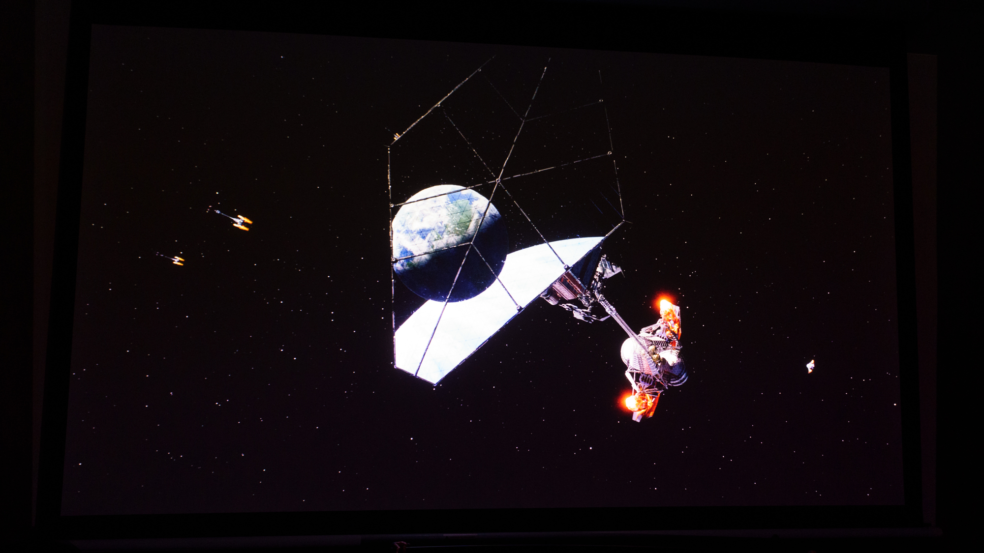 A picture projected on a screen by a JMGO N3 Ultimate projector