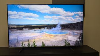 Samsung Q60D with geyser on screen