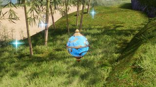 A blue Pal Sphere sparkles after it catches a Pal.