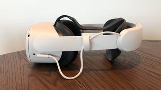 The Oculus Quest 2 with Elite Strap and Battery on a table