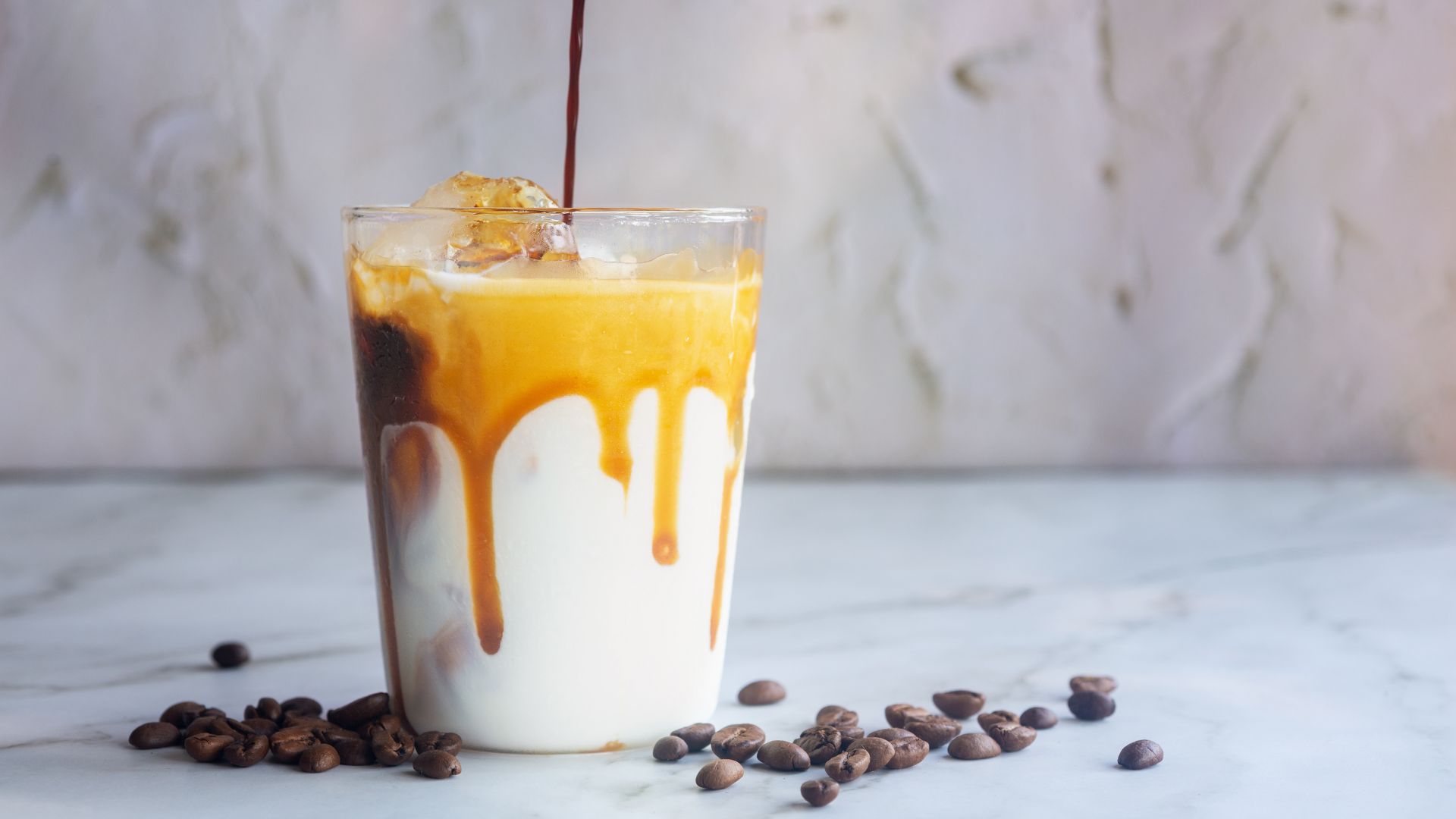 Iced coffee on a marble counter
