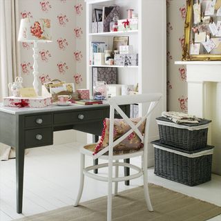 home office with work desk chair wicker chests and bookcase