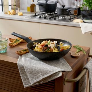 Dunelms conscious choice range wok in kitchen cooking dinner
