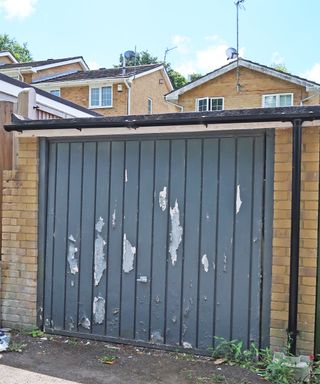 Tired garage door before