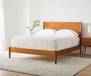Mid-Century Bed against a white wall.