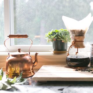 Copper kettle and glass coffee drip