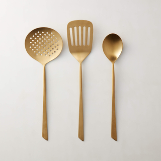 gold serving utensils