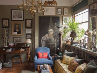 Plants, yellow sofa and wooden desk