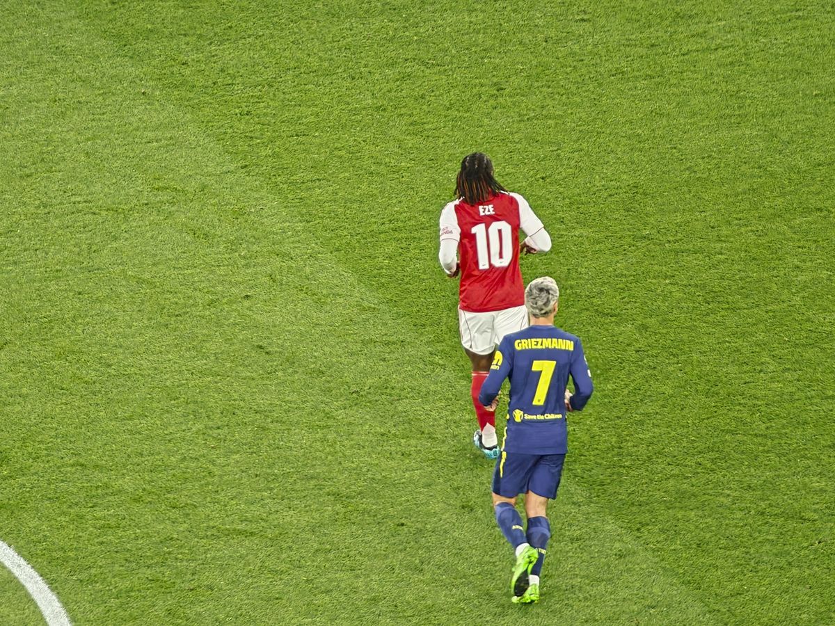 A Champions League soccer match between Arsenal and Atletico Madrid, as seen from the upper stand at the Emirates stadium, London. Zoomed in photos of the players