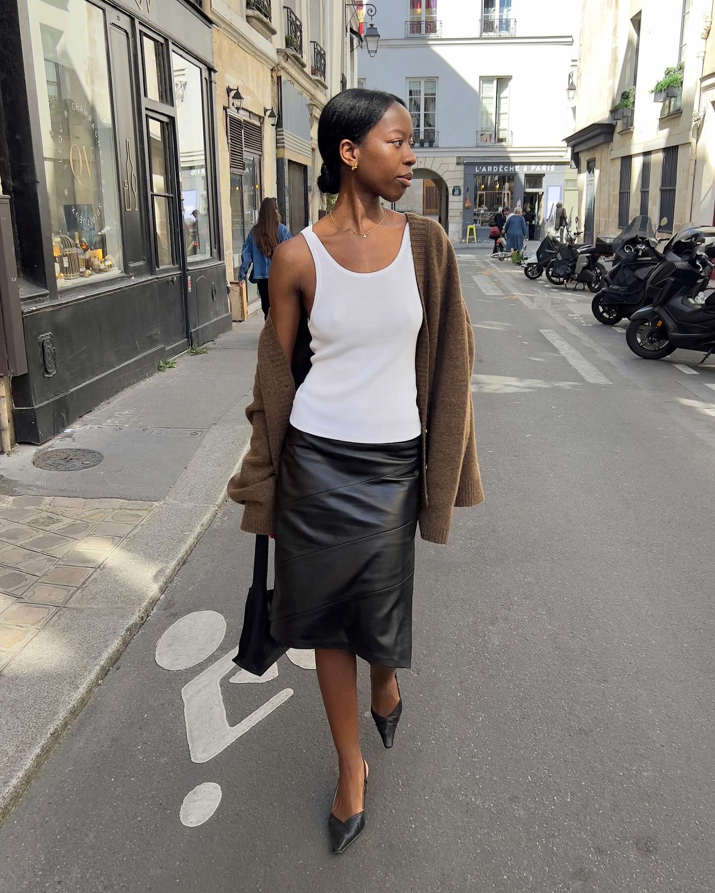 A woman in Paris wearing low bread hairstyle
