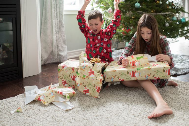 Christmas toy shortage Brother and sister opening christmas presents