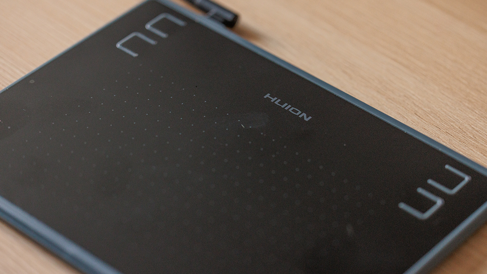 A Huion H430P drawing tablet after six months of use for photo editing