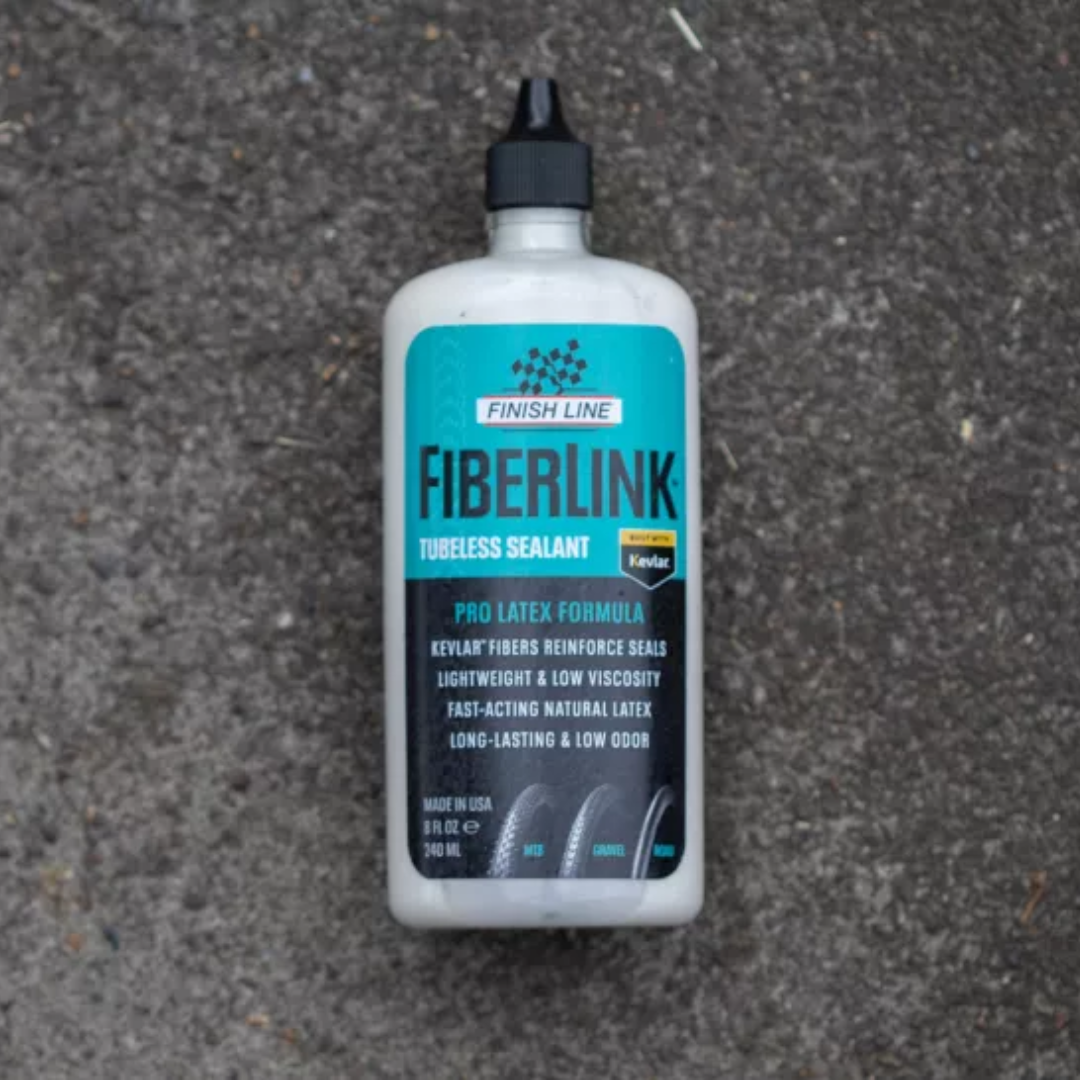 A bottle of Finish Line Fiberlink on a concrete background