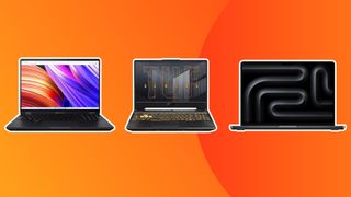 three laptops for game development on an orange background