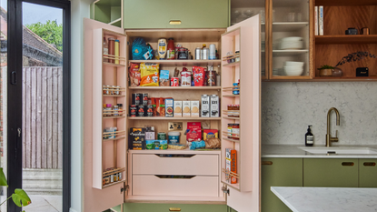 A pantry with wooden doors