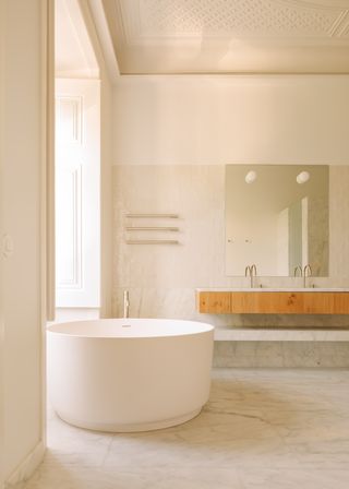 A bathroom with a muted palette