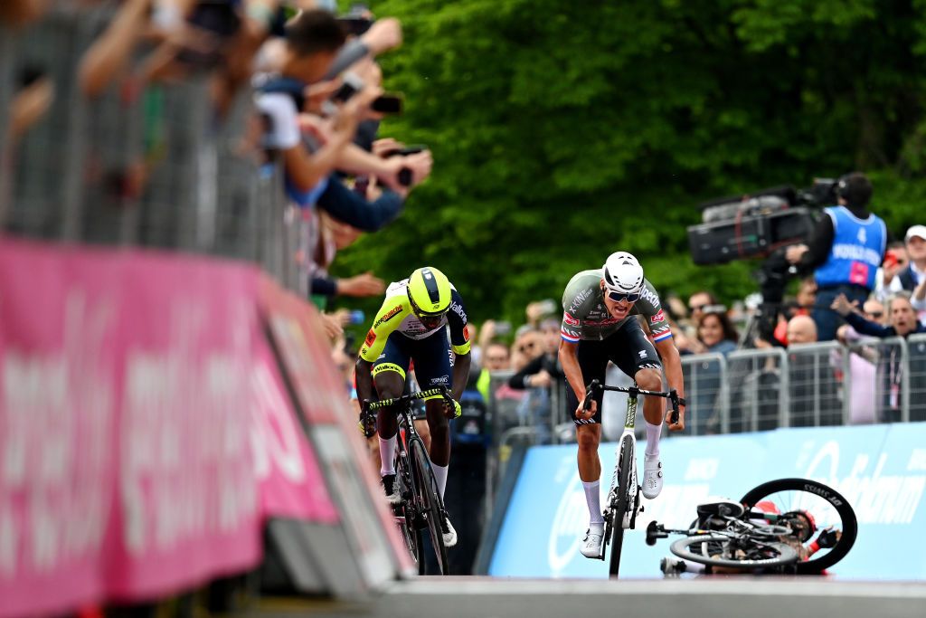 VISEGRAD HUNGARY MAY 06 LR Hailu Biniam Girmay of Eritrea and Team Intermarch Wanty Gobert Matriaux Mathieu Van Der Poel of Netherlands and Team Alpecin Fenix and Caleb Ewan of Australia and Team Lotto Soudal crash sprint at finish line during the 105th Giro dItalia 2022 Stage 1 a 195km stage from Budapest to Visegrd 337m Giro WorldTour on May 06 2022 in Visegrad Hungary Photo by Stuart FranklinGetty Images