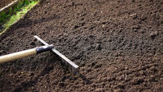 Soil being raked
