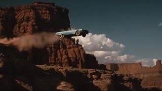 A car flying off a cliff at the end of Thelma and Louise