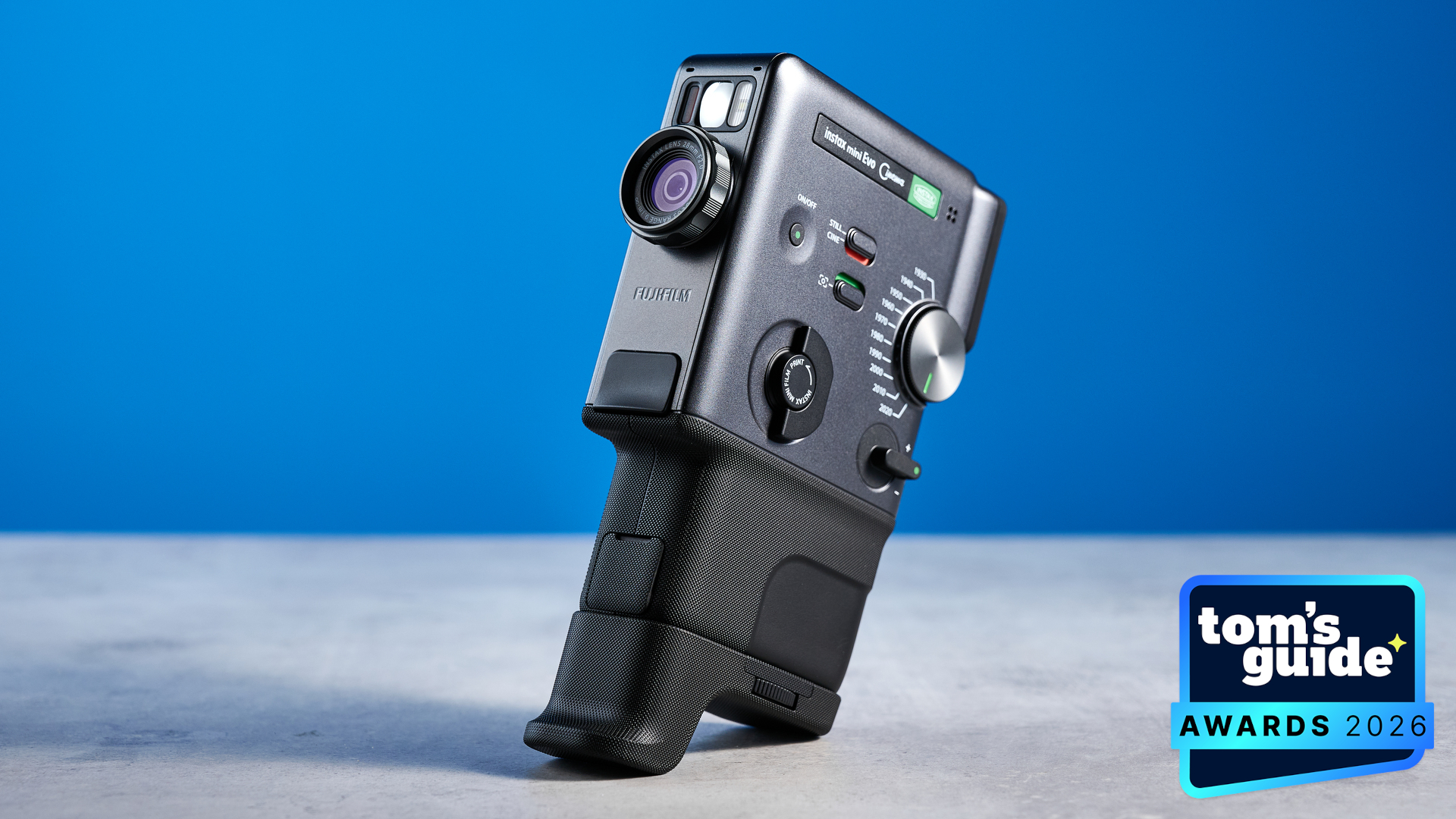 The Fujifilm Instax mini Evo Cinema with a TG Awards 2026 badge