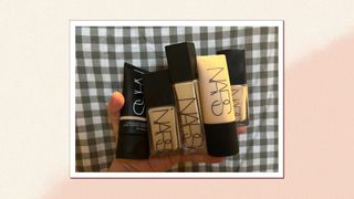 Senior beauty editor Rhiannon Derbyshire holding all five options of the best NARS foundation