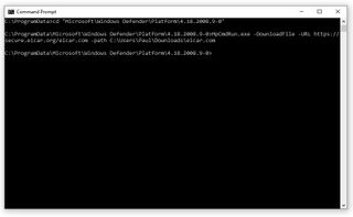 A screen grab of a Windows Defender command-line tool downloading simulated malware.