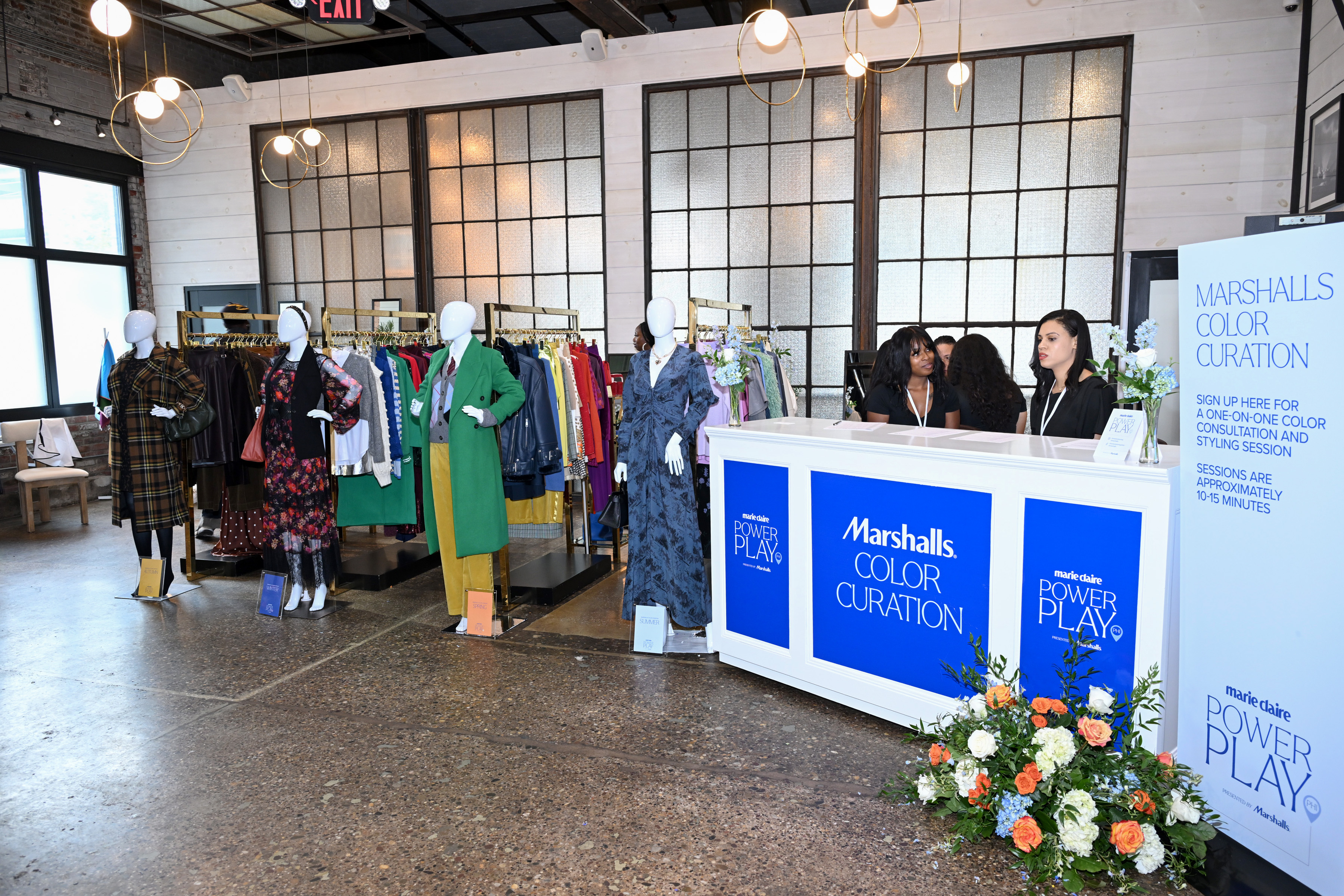 The Marshalls Color Curation experience at Power Play Philadelphia, featuring racks of fall fashion, mannequins styled in bold outfits, and consultants welcoming guests at a branded booth.