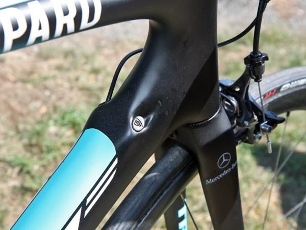 Trek's internal cable routing setup can accommodate either mechanical or electronic drivetrains. A little plug seals the lone unused hole while the rest of the ports are used for the wiring harness.