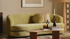 A modern lounge with a light green suede sofa and other home accessories from John Lewis.