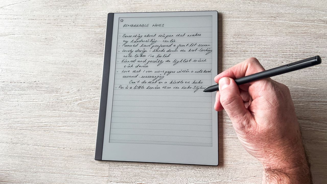 A person writing notes on the reMarkable 2