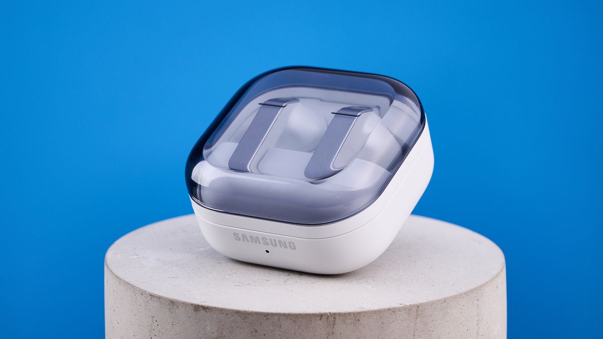 the samsung galaxy buds 4 pro in white photographed against the blue tom's guide background