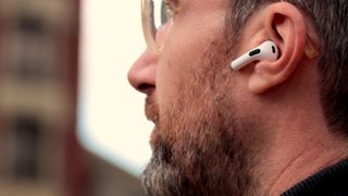 Apple AirPods 3rd Gen review, buds in man's ear