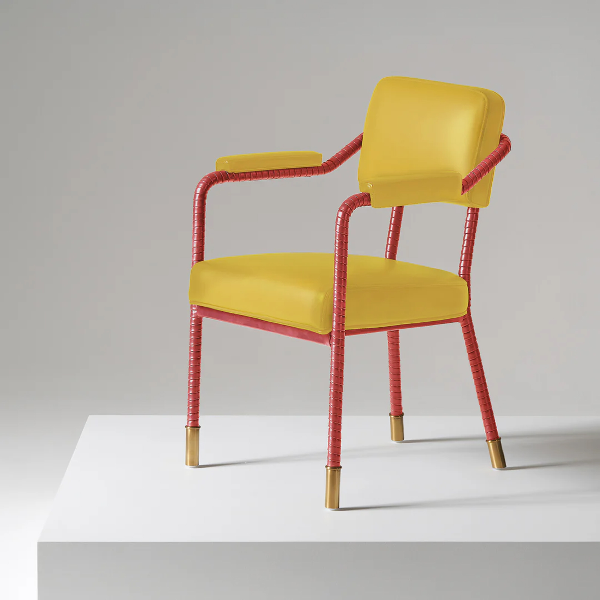 a yellow and red dining chair