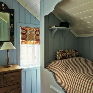 how to panel a wall, pastel blue and yellow tongue and groove guest room in cottage