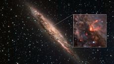 A bright red arc of light seen against greyish red clouds in space. hundreds of stars dot the background