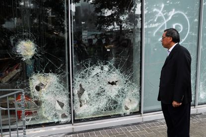 Damage incurred a day after protests broke out in Hong Kong.