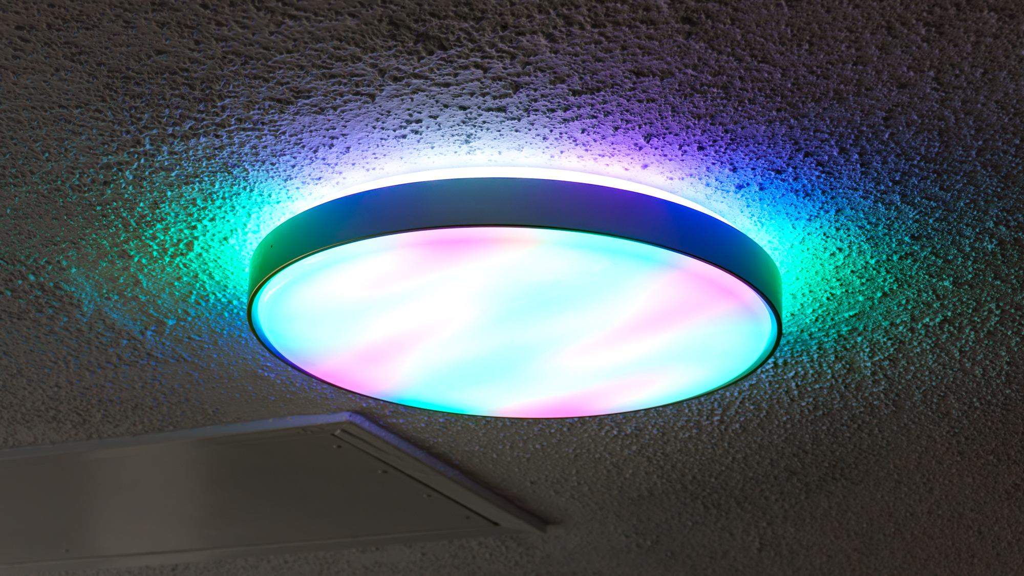 The Govee Ceiling Light Ultra installed on the ceiling and syncing up with music