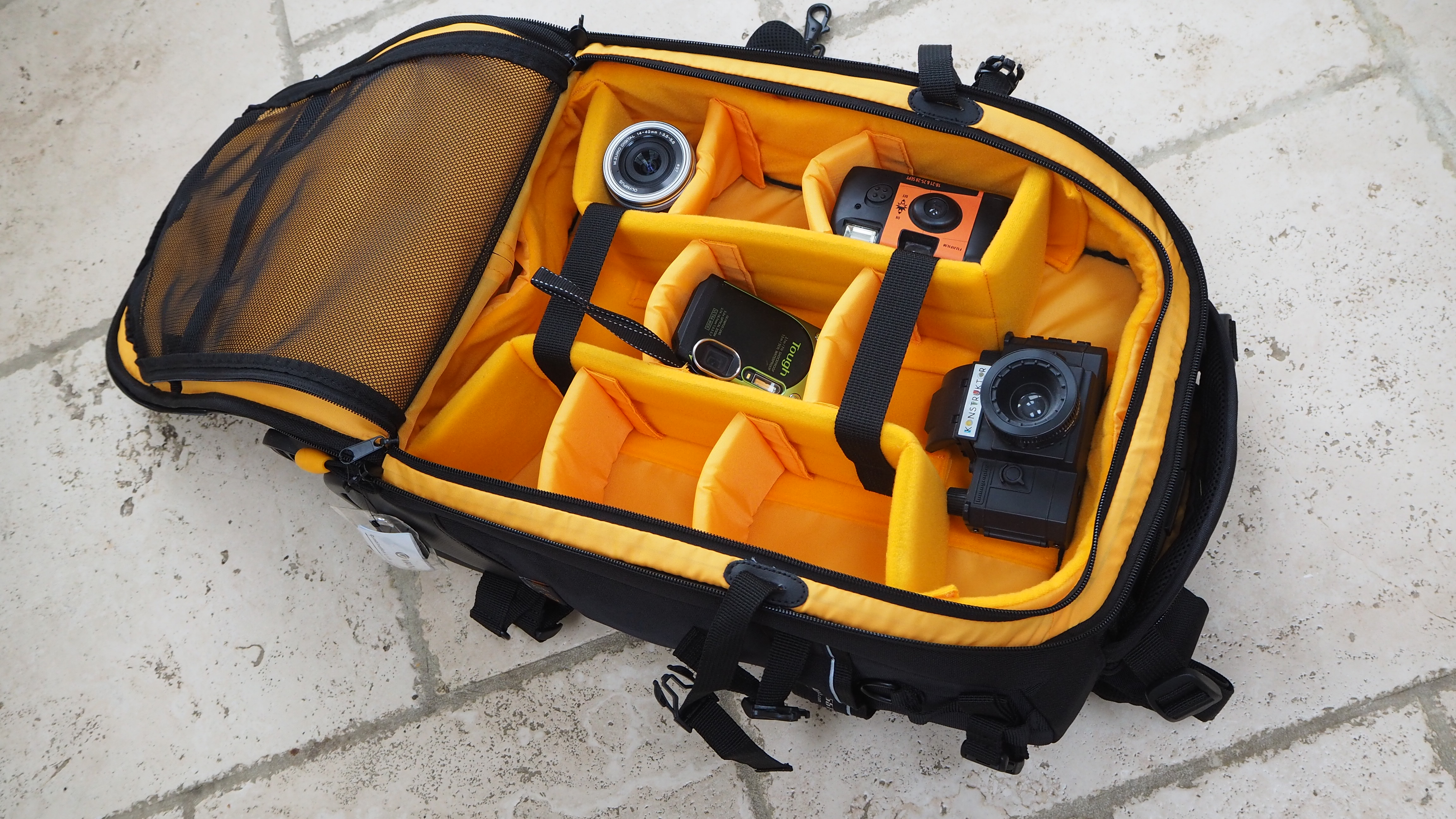 Vanguard Alta Fly 55T G2 on a tiled floor