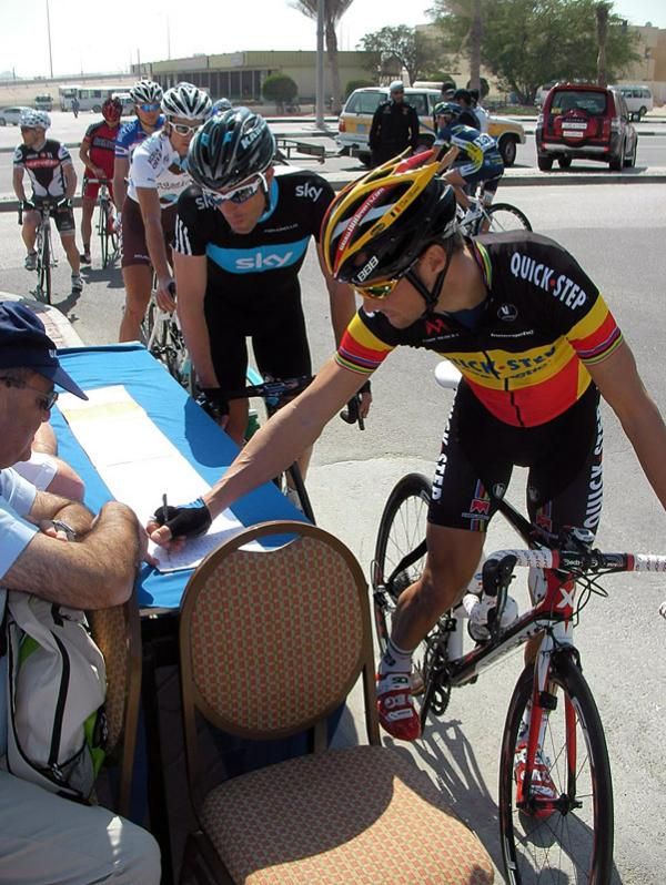 Tom Boonen (Quick Step) signs on in the sunshine.