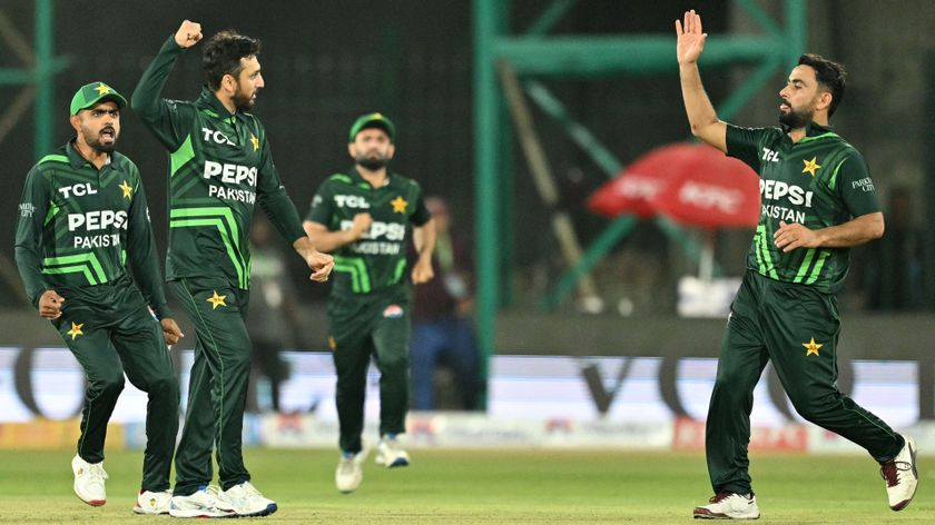 Pakistan&#039;s ODI team celebrate after taking a wicket against New Zealand in a match ahead of the ICC Champions Cup