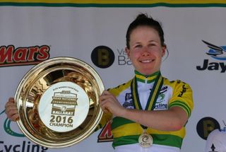 Amanda Spratt with her gold pan for winning the Australian road title
